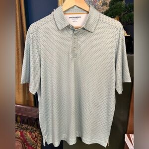 Johnson & Murphy Men’s Performance Polo. 
Golf course flag theme